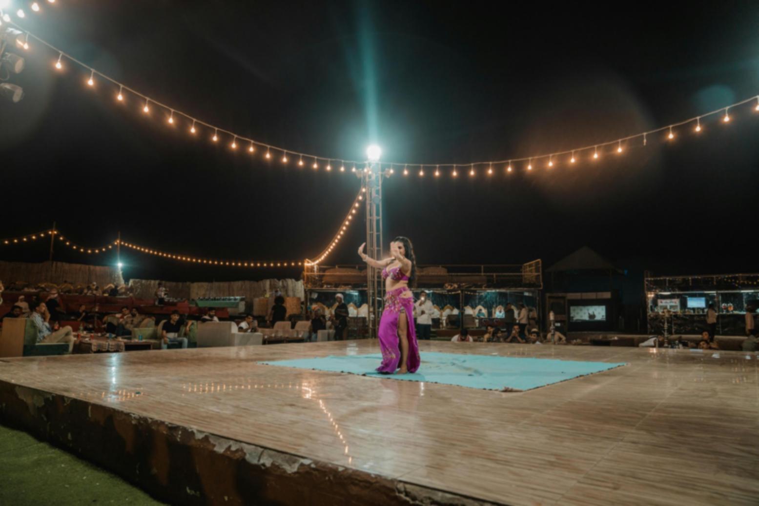 Students engaged in classical drama discussion and theatrical text analysis