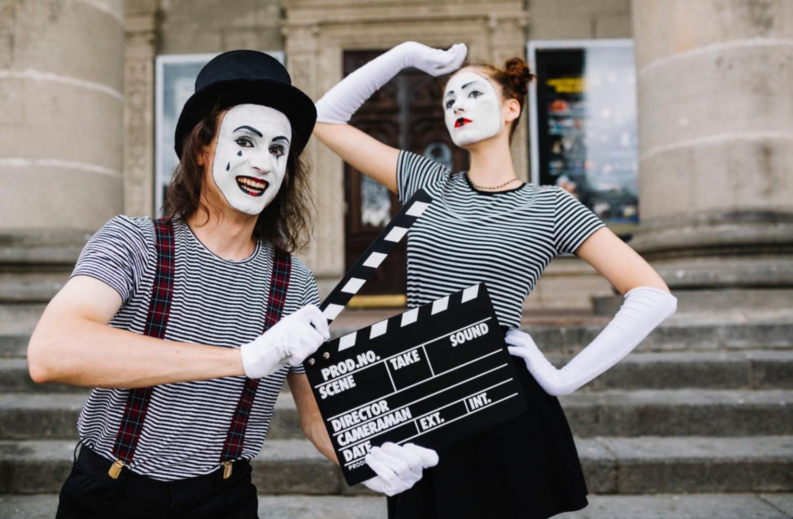 Classical drama study environment with historical texts and educational materials